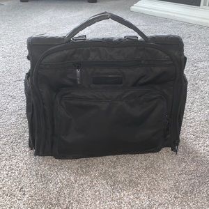 JuJuBe BFF diaper bag backpack in onyx with 2 pouches and shoulder strap.